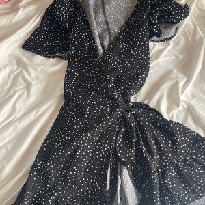 Black naggoo wrap dress. Small